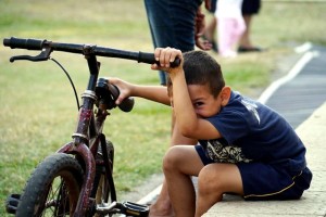 Hogar-Cristiano-orphanage-boy-with-bike-Matthew-Borror
